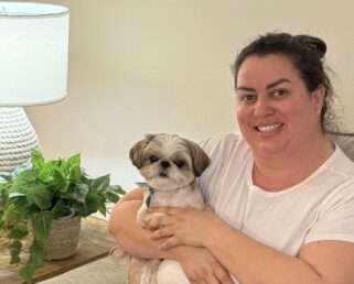 Chrisa in her newly furnished apartment