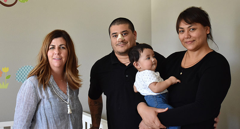 Designer Danielle Murrieta with Sergeant Velasquez, his wife, and baby